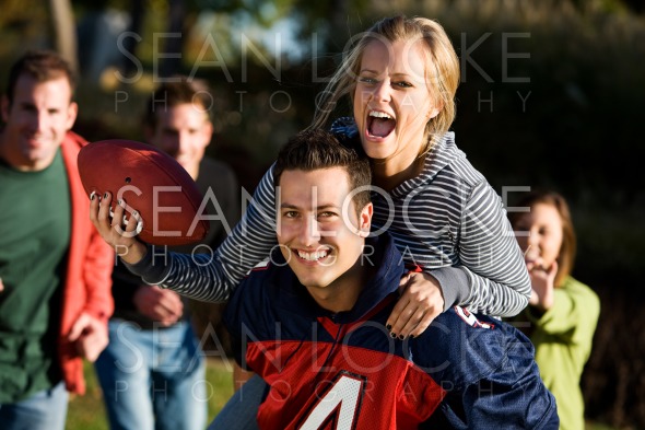 Football: Piggyback Girl Going for Touchdown - Sean Locke Photography Shop